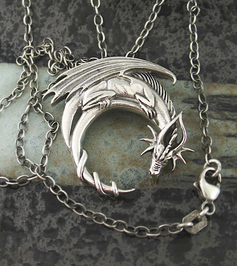 Entwined Winged Dragon And Crescent Moon Pendant